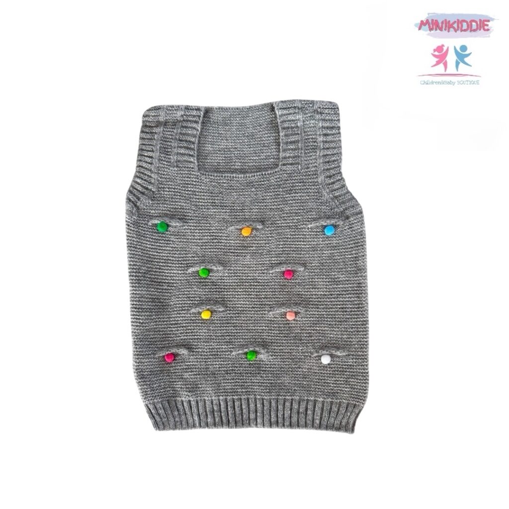 Детски плетен елек с цветни детайли